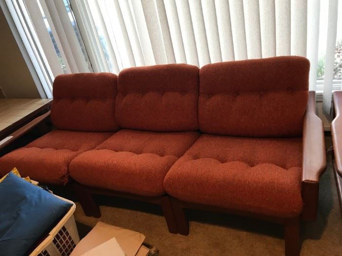 #82	mid century wood and orange cushion sofa 78 long	 $300.00 
