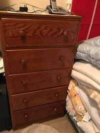#85	wood chest of drawers w 5 drawers a24x14x45	 $65.00 
