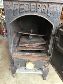 #102	Federal Cast Iron Stove 	 $300.00 
