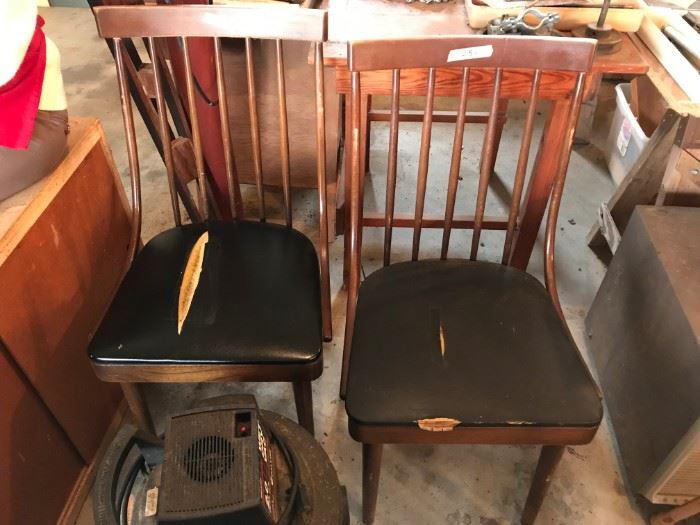 #105	(2) Odd Mid-century Style Dining Chairs w/black vinyl Seats   $25 each	 $50.00 
