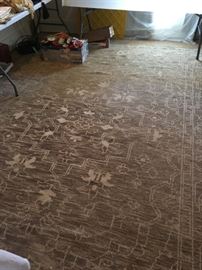 Large beige and brown rug