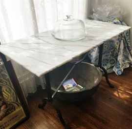 Antique French Marble Bistro Console Table with Cast Iron Base. One of the top five gems found in this sale!