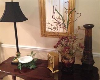 Sofa table, mirror, and accessories