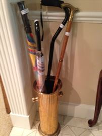 Canes and umbrellas and brass holder