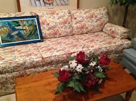 Floral sofa; coffee table