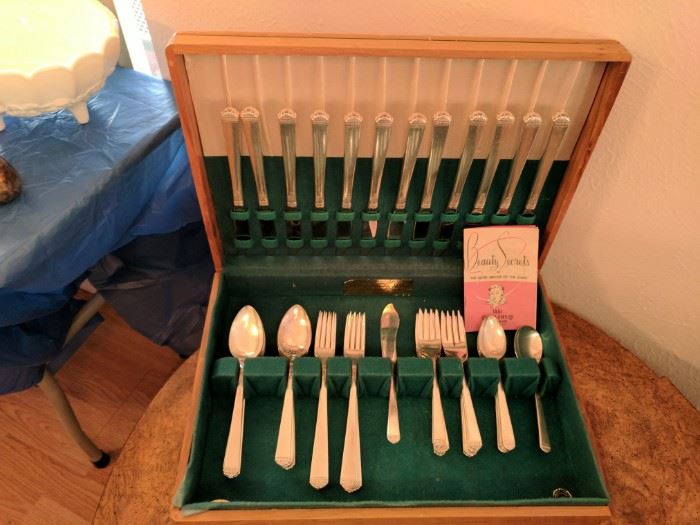 Nearly complete set of silverplate tableware. Some of the pieces were still in their plastic wrappings. Missing two spoons.