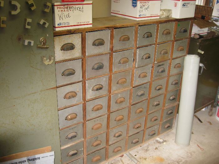 Large vintage metal and wood storage unit.  Great magnets, too.