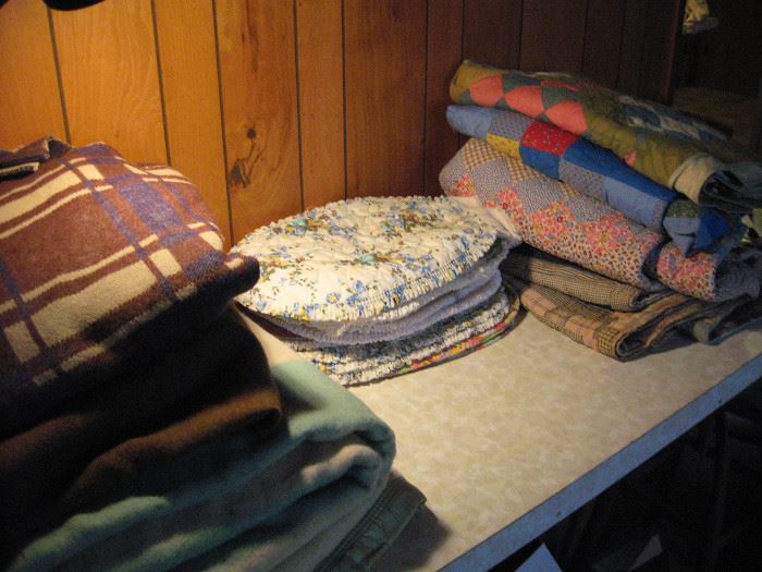 Just a few household items.  Old wool blankets, quilts, and placemats.