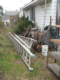 Ladders and old wheel barrows, and carts.