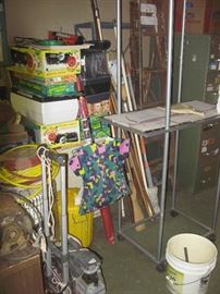 A plant seeding rack along with seed starting supplies.