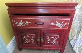 One of a pair of  Rosewood, with inlay, night stands front view