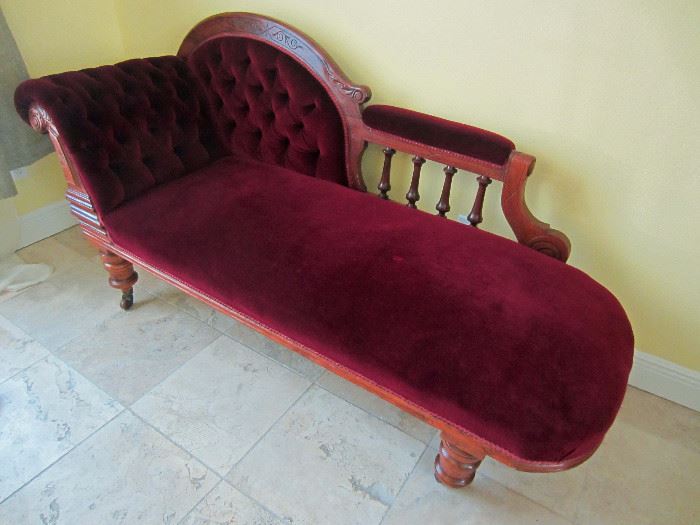 Antique chaise, fainting couch, from England.  Matches chair.  Also, very sturdy.