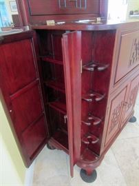Rosewood bar cabinet with side doors open