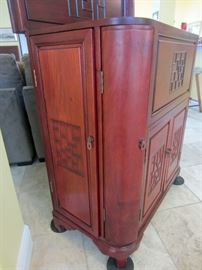 Rosewood bar cabinet side view
