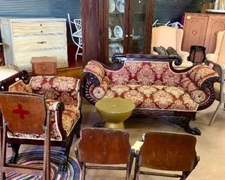 Empire sofa and club chair. Red Cross wooden folding chairs. 