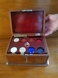 Antique box with game chips 