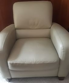 Pleather chair. Also a matching loveseat is available. Nice light mint color. Good condition. No visible signs of wear.