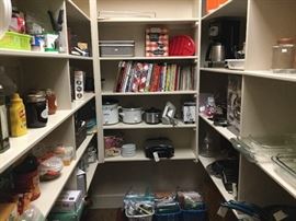 Large, fully stocked pantry-Cookware-pots and pans-mandolin-serving and storage pieces-Cookbooks