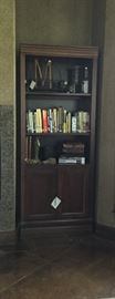 Tall mahogany bookcase with storage.  One of two of a matching pair.