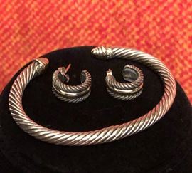 David Yurman .925 and14 KT yellow gold rope twist bracelet and matching earrings. 
BRACELET IS SOLD