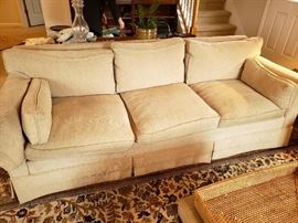 Neutral Comfortable Attractive Down Stuffed Sofa. 