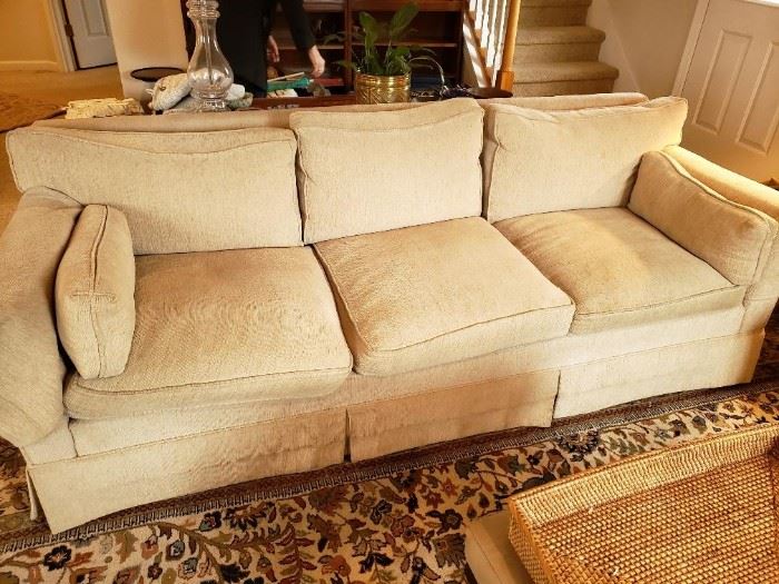 Neutral Comfortable Attractive Down Stuffed Sofa.