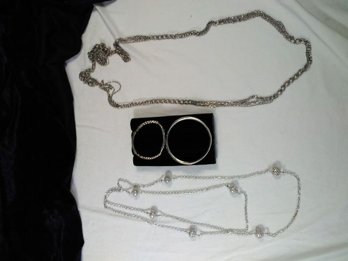 2 extra long silver style necklaces and two bangle bracelets https://ctbids.com/#!/description/share/125111