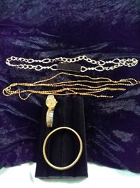 Lorus wrist watch, gold stretch bracelet, gold multi-strand necklace, gold linked belt https://ctbids.com/#!/description/share/125116
