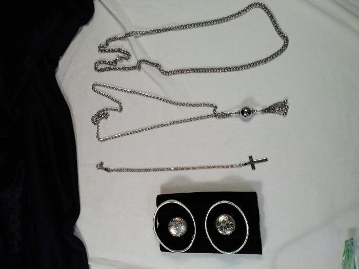 three silver style necklaces, two silver style bracelets, one pair of clip-on earrings https://ctbids.com/#!/description/share/125120