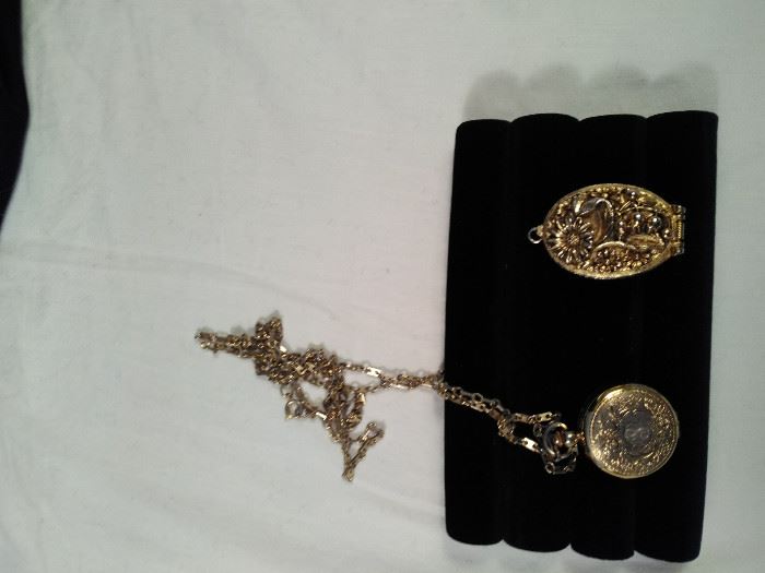 2 vintage gold style necklace watches , one Vogue, 1 baroness with chain https://ctbids.com/#!/description/share/125131