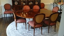 Henredon dining table with two leaves and pads. Purchased at Hollbergs Fine Furniture. Eight chairs sold separately from the table. 