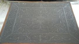 Top of Theoadore Alexander cocktail table. Etched brass panel.