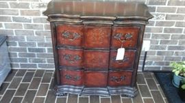 Block front three drawer chest.