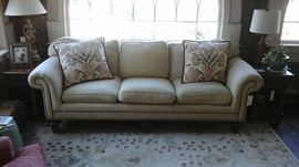 Cozy three cushion sofa.