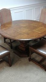 Stickley round pedestal table and four chairs. Purchased from Hollbergs Fine Furnishings. 