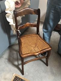 One of 8 cane chairs Tiger maple