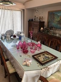 currier & Ives cat picture, cranberry glass, noritake, hurricane oil lamps, massive dining room set - the tall cabinet in the back has sold