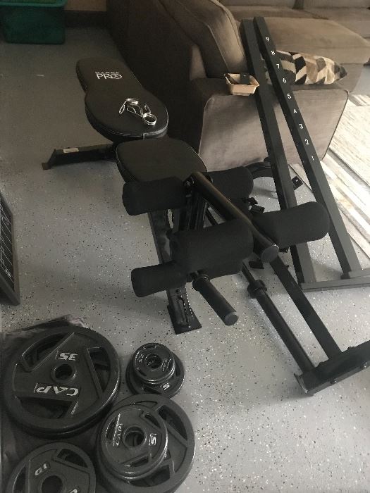 Weight Bench with weights and weight bar holder. Like new!