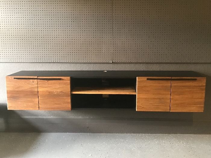 Gorgeous floating console from crate and barrel. https://www.crateandbarrel.com/rigby-80.5-large-floating-media-console/s500833