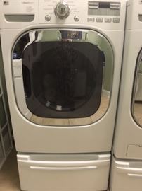 LG Washer: LG WM2801HWA
LG Dryer: LG DLEX2801W
Both are on stands and are 53” H x 27” W x 27” D (without stand 39” H)