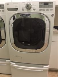 LG Washer: LG WM2801HWA
LG Dryer: LG DLEX2801W
Both are on stands and are 53” H x 27” W x 27” D (without stand 39” H)
