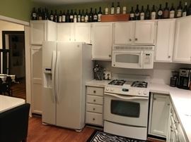 Kitchen appliances, Refrigerator ,range, microwave and dishwasher.