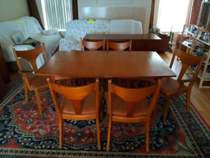 Teak dining table w/3 leaves and pads