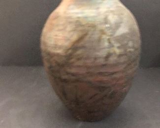 signed pottery/metal vase