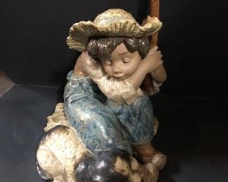 lladro boy with walking stick and dog