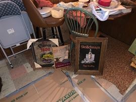 vintage mirror bar photos and four metal folding chairs. 