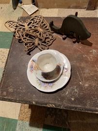 china butterflies and wooden cat on stand 