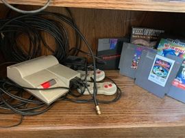 vintage gaming station and games