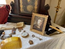 Vintage watch, hair combs , key , locket, war medals 
