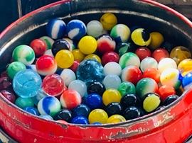 Vintage tin with marbles sold as a set
